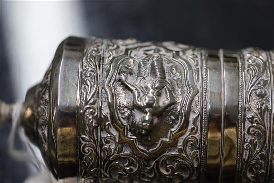 A Burmese embossed silver horn-shaped scroll holder and cover on hardwood stand, 41.5cm